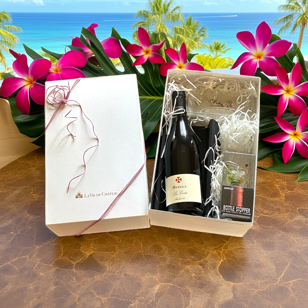 Un cadeau qui comprend du LaCoste (vin blanc parfumé du sud de la France) et 2 accessoires.