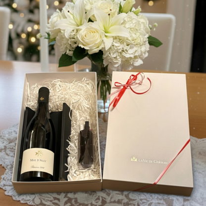 Un cadeau de vin rouge enchanteur et un décapsuleur Lecouse