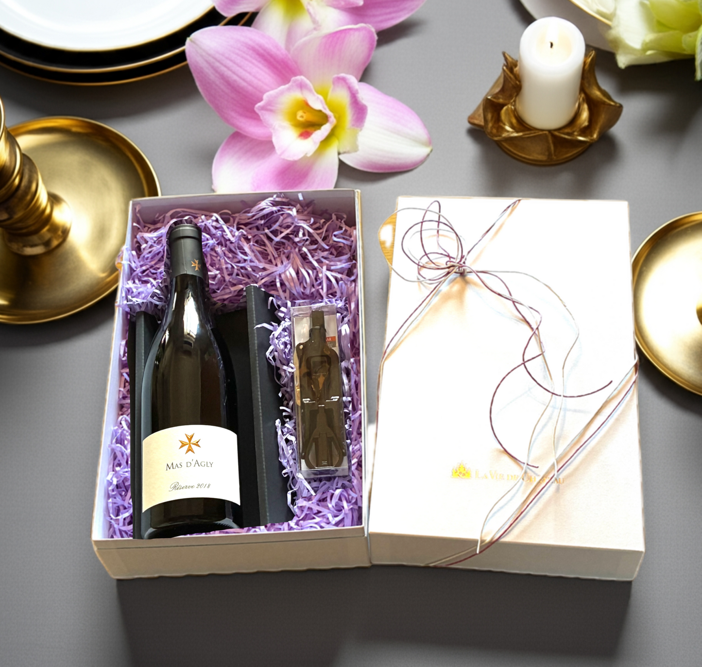 Un cadeau de vin rouge enchanteur et un décapsuleur Lecouse